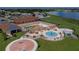 Aerial view of the community pool and seating areas, perfect for relaxing and socializing at 2330 Lawrence Hall St, Ruskin, FL 33570