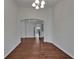 Dining room with wood floors, neutral paint, and chandelier at 2330 Lawrence Hall St, Ruskin, FL 33570