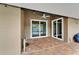 Covered patio and outdoor dining area leading to screened-in pool at 2330 Lawrence Hall St, Ruskin, FL 33570
