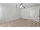 Roomy bedroom featuring neutral walls, light floors, recessed lighting and a door to an additional room at 2449 16Th N St, St Petersburg, FL 33704