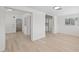Spacious living room with new flooring and plenty of natural light at 2449 16Th N St, St Petersburg, FL 33704