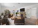 Staged living room featuring an inviting fireplace, neutral paint, and recessed lighting at 2449 16Th N St, St Petersburg, FL 33704