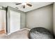 Bedroom showcasing a closet, fan, a ceiling light, and neutral wall color at 25623 Inkwood Pl, Wesley Chapel, FL 33544