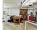 Well-organized garage featuring a workbench and ample storage space at 25623 Inkwood Pl, Wesley Chapel, FL 33544
