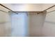 This is an image of an empty closet with a metal clothing rack at 2932 Lichen Ln # D, Clearwater, FL 33760