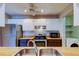 Updated kitchen with modern appliances and wood countertops, including a stainless steel sink at 2932 Lichen Ln # D, Clearwater, FL 33760