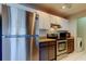 Bright kitchen features stainless steel appliances and updated countertops for a modern look at 2932 Lichen Ln # D, Clearwater, FL 33760