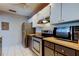 Kitchen features stainless steel appliances, wood countertops, and ample cabinet space at 2932 Lichen Ln # D, Clearwater, FL 33760