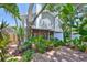 A secluded backyard surrounded by lush landscaping offers a private oasis with a patio at 3053 S Concordia Ave # A, Tampa, FL 33629