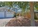 Charming two-story home with a two car garage and beautiful rock and bark landscaping at 3053 S Concordia Ave # A, Tampa, FL 33629