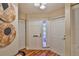 Inviting foyer with wood floors and modern art pieces at 3053 S Concordia Ave # A, Tampa, FL 33629