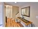 Hallway with hardwood floors and neutral paint at 3053 S Concordia Ave # A, Tampa, FL 33629