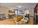 Cozy living room with hardwood floors, neutral paint, and modern furniture at 3053 S Concordia Ave # A, Tampa, FL 33629