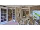Relaxing screened-in patio with tiled flooring and a view of the backyard at 3053 S Concordia Ave # A, Tampa, FL 33629