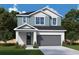 Charming two-story home featuring a two-car garage, a well-manicured lawn, and professionally landscaped flower beds at 31343 Pendleton Landing Cir, Wesley Chapel, FL 33545