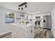 Modern kitchen featuring stainless steel appliances and a stylish island at 3401 Truman Dr, Holiday, FL 34691