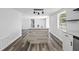 Spacious kitchen featuring an island with modern fixtures, and stainless appliances at 3401 Truman Dr, Holiday, FL 34691