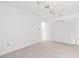 Bedroom featuring track lighting and closet space at 4208 W Flora St, Tampa, FL 33614