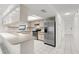 Bright kitchen with stainless steel appliances, sleek countertops, and plenty of cabinet space at 4208 W Flora St, Tampa, FL 33614
