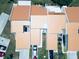 Overhead view showcasing home exteriors, driveways, and vehicle parking in a neighborhood at 4360 Outrigger Ln, Tampa, FL 33615