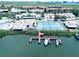 Waterfront community featuring tennis courts and boat docks in a tranquil setting at 4360 Outrigger Ln, Tampa, FL 33615