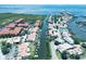 Aerial view of waterfront community with boat docks and water access at 4360 Outrigger Ln, Tampa, FL 33615