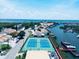 Waterfront community featuring tennis courts, boat docks, and views of the bay at 4360 Outrigger Ln, Tampa, FL 33615