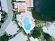An aerial view of the community pool and lake showcasing the ideal location at 4360 Outrigger Ln, Tampa, FL 33615