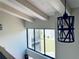 Bright interior view of a home showcasing unique architecture and modern lighting fixtures at 4360 Outrigger Ln, Tampa, FL 33615