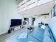 Bright living room featuring hardwood floors, modern furniture, and natural light at 4360 Outrigger Ln, Tampa, FL 33615