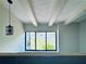 View from the upper floor to a window with greenery outside at 4360 Outrigger Ln, Tampa, FL 33615