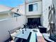 Private patio with ample seating, perfect for outdoor dining and relaxation at 4360 Outrigger Ln, Tampa, FL 33615