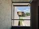 View from the patio with a view of the building and blue skies at 4360 Outrigger Ln, Tampa, FL 33615