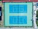 Aerial shot of community tennis courts on a sunny day with ample parking at 4360 Outrigger Ln, Tampa, FL 33615