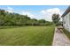 View of the lawn and landscaping of the backyard at 4583 Barletta Ct, Wesley Chapel, FL 33543