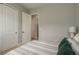 Neutral bedroom featuring a closet, large window and light-colored walls at 4583 Barletta Ct, Wesley Chapel, FL 33543