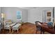 Comfortable bedroom with wood floors, lots of windows, and a workspace desk at 475 28Th N Ave, St Petersburg, FL 33704