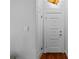 Bright hallway with hardwood floors, and modern lighting at 475 28Th N Ave, St Petersburg, FL 33704