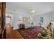Inviting living room with hardwood floors, rug, and stylish furniture at 475 28Th N Ave, St Petersburg, FL 33704
