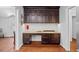Charming office nook with dark wood cabinetry and a desk area at 475 28Th N Ave, St Petersburg, FL 33704