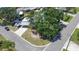 Aerial view of the property highlighting the corner lot location, landscaping, and convenient carport at 489 Fox Run Trl, Apollo Beach, FL 33572
