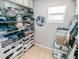 Walk-in closet featuring wire shelving for ample storage space at 489 Fox Run Trl, Apollo Beach, FL 33572