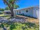 Exterior of a house on a sunny day with a boat in the driveway at 489 Fox Run Trl, Apollo Beach, FL 33572