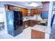 Kitchen with granite countertops, stainless steel appliances, and ample cabinet space at 489 Fox Run Trl, Apollo Beach, FL 33572