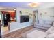 Open-concept living space with a view of the kitchen and adjacent living room at 489 Fox Run Trl, Apollo Beach, FL 33572