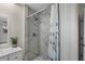 Updated shower stall with decorative tile surround at 4976 Cedarbrook Ln, Hernando Beach, FL 34607