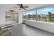 Relax on your private screened in patio overlooking the water with plenty of seating and shade at 4976 Cedarbrook Ln, Hernando Beach, FL 34607