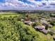 Aerial view of the townhouse complex, showing the nature preserve nearby at 507 E Curlew Pl, Tarpon Springs, FL 34689