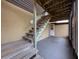 Outdoor patio with stairs leading up to the second level at 507 E Curlew Pl, Tarpon Springs, FL 34689
