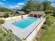 Aerial view of the community pool and patio area at 507 E Curlew Pl, Tarpon Springs, FL 34689